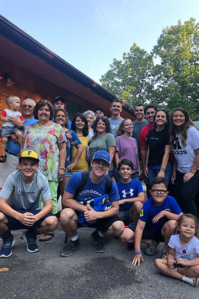 Justin Edmisten with his extended family posing for a photo